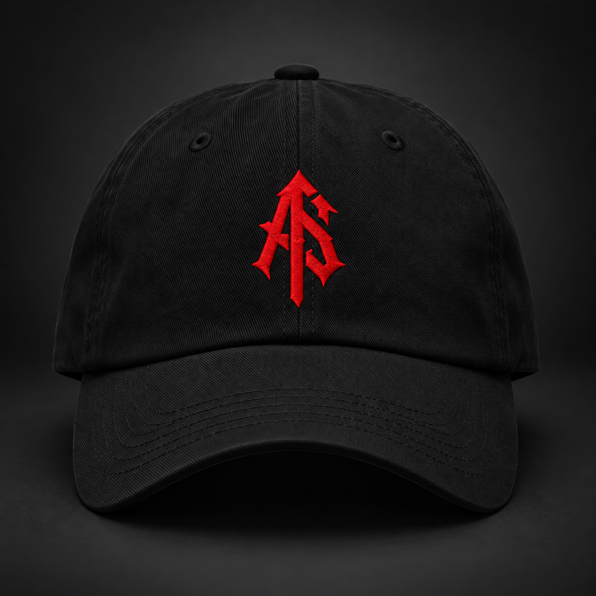 Front view of black ApathySaves cotton dad hat featuring the red embroidered interlocking AS monogram
